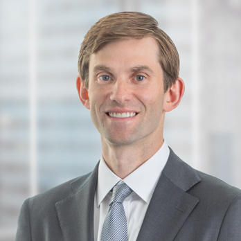 David M. Thompson Logo